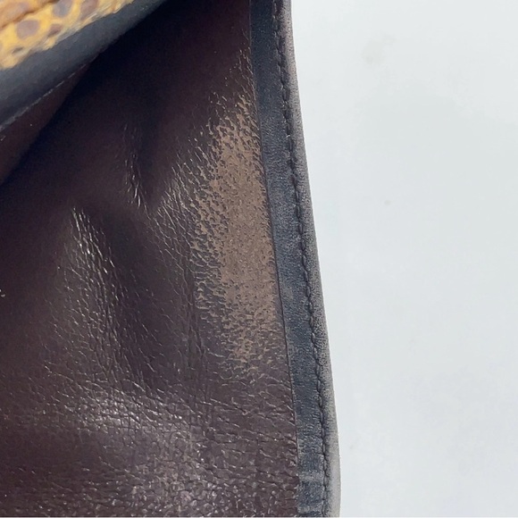 Auth GUCCI 035.0959.2131 Python
Jackie Bifold Brown Wallet - Picture 14 of 16